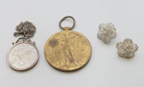 A pair of silver filigree earrings,