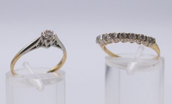 Two unmarked gold, platinum and diamond-set rings. Solitaire ring size M, seven stone ring size N.