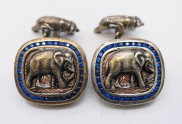 A pair of silver elephant cufflinks bearing Russian marks. 2 cm wide.