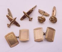 Three pairs of 9 ct gold cufflinks, including a pair formed as Spitfires. Spitfires 2 cm x 1.5 cm.