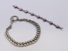 A silver pocket watch chain and a silver bracelet. Watch chain 28 cm long, bracelet 16 cm long.