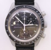 A Swatch x Omega Bioceramic MoonSwatch Collection 'Mission to the Moon' wristwatch with black dial