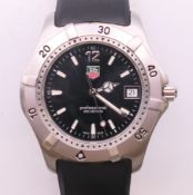 A Tag Heuer 2000 Professional WK1110-0 black dial gentleman's wristwatch (in working order) with