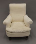 A Victorian armchair. 82 cm wide.