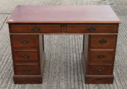 A Victorian walnut desk. 110 cm wide x 56 cm deep.