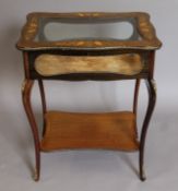 A 19th century inlaid mahogany vitrine. 63 cm wide.
