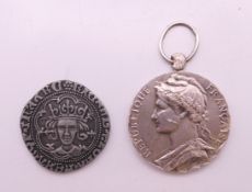 A silver French Ministere du Travail medal presented to M Rouet 1977 formed as a pendant and a