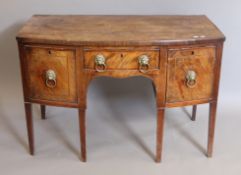A George III mahogany sideboard. 218 cm wide.