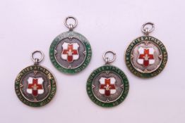 Four Northern Counties Athletic Association silver medals for the 880-yard race,