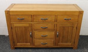 A modern oak sideboard. 139 cm wide.