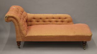 A Victorian button-upholstered chaise lounge. 180 cm long.