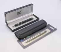 A boxed ballpoint pen marked Mont Blanc,