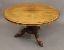 A Victorian tilt-top breakfast table. 126 cm diameter.