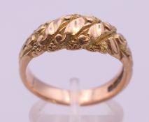 A 9 ct gold gentlemen's ring. Ring size S/T. 7.1 grammes.