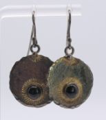 A pair of silver earrings, makers mark for Margaret Bolton. 2.25 cm diameter.