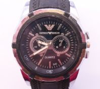 A gentlemen's Armani wristwatch. 4.75 cm wide.