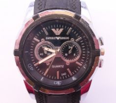 A gentlemen's Armani wristwatch. 4.75 cm wide.