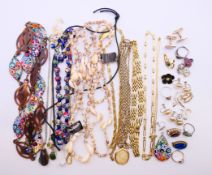 A quantity of various costume jewellery, including Venetian glass beads,