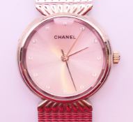 A Chanel ladies' stainless steel wristwatch. 3.25 cm wide.