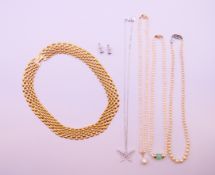 Three pieces of boxed Swarovski jewellery, including a necklace,
