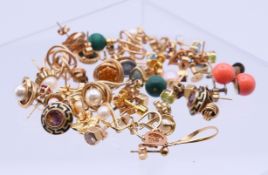 A quantity of various gold and other earrings. The coral pair 8 mm high. 34.6 grammes total weight.