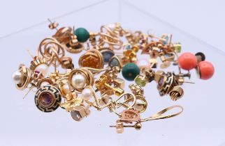 A quantity of various gold and other earrings. The coral pair 8 mm high. 34.6 grammes total weight.