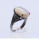 A silver and opal ring. The opal 1.8 cm x 1.2 cm. Ring size S. - Image 3 of 5