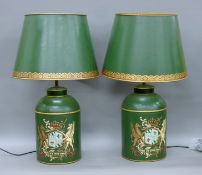 A pair of green toleware lamps. Each 71 cm high.