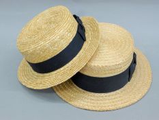 Two straw boaters, the larger sized 7 3/8.