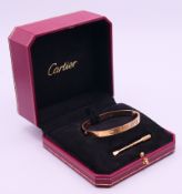 A Cartier four-stone diamond-set 18 ct gold 'Love' bracelet, signed,