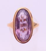 A 9 ct gold amethyst ring. Ring size L. 4.7 grammes total weight.