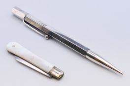 A silver BEKA propelling pencil and a mother-of-pearl and silver fruit knife. The former 12 cm long.