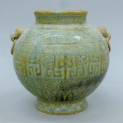 A Chinese celedon pottery vase. 21 cm high.
