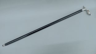 A walking stick, the handle formed as a leaping jaguar. 92 cm long.