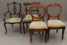 Four various Victorian mahogany chairs, two with arms. The largest 54 cm wide.