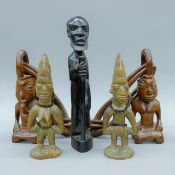 A quantity of African wooden figures. The largest 31 cm high.