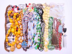 A quantity of costume jewellery, to include: bead necklaces, a Gamsbart hair hat pin,