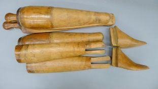 A pair of wooden riding boot trees. 54.5 cm high.