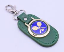 A boxed Rolex Wimbledon keyring. 11 cm high.