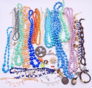 A quantity of various jewellery to include bead necklaces, brooches, an intaglio seal,
