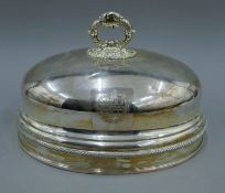 A silver-plated meat cover. 33 cm long.