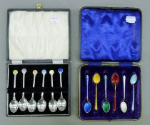 A set of six enamelled Danish sterling silver spoons and a set of six spoons with enamelled