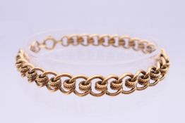 A 9 ct gold bracelet. 20 cm long. 25.6 grammes.