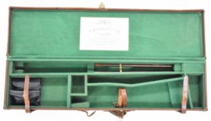 Leather and canvas bound shotgun carry case with 'Westley Richards  & Co Ltd 33 Conduit Street