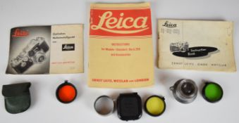 Leitz Elmar 5cm 1:3.5 lens, serial number 543055, circa 1940, with rear cap, three filters, lens