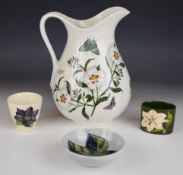 Moorcroft cache pots and bowls and a Portmeirion jug decorated in the Botanic Garden pattern,