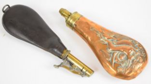 Two powder and shot flasks, one copper and brass with embossed game decoration, the other leather