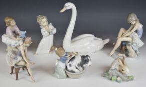 Seven Lladro child, animal and bird figures including Collector's Society editions to include two