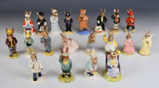 Twenty Royal Doulton Bunnykins figures including Doctor, Autumn Days, Royal Family members, Be