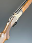 Lanber 12 bore over and under ejector shotgun with engraved birds surrounded by scrolling decoration